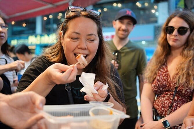 Hong Kong Street Food Tour with Locals - Dim Sum, Wonton & more - Wing Lok Street: dim sum baskets and the dried seafood reality check