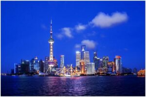 Shanghai: Night River Cruise Tour with Xinjiang Style Dining - Pickup and private transport: skipping the metro grind
