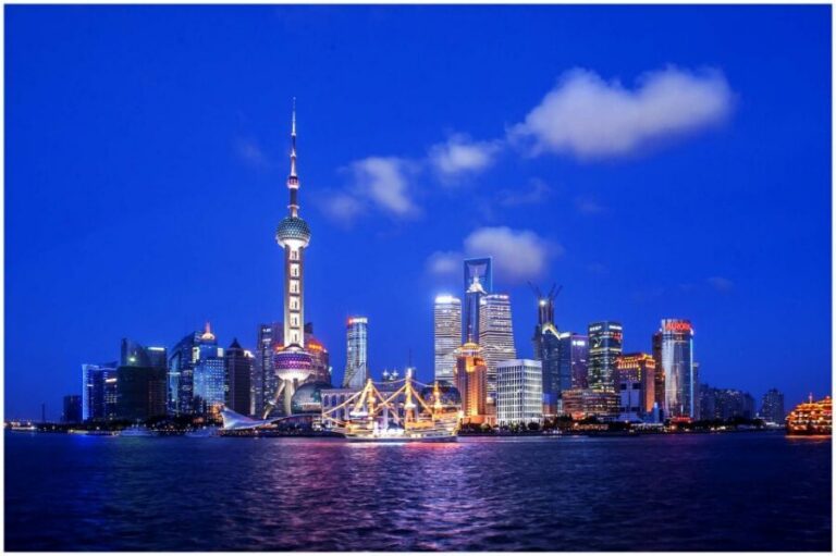 Shanghai: Night River Cruise Tour with Xinjiang Style Dining - Pickup and private transport: skipping the metro grind
