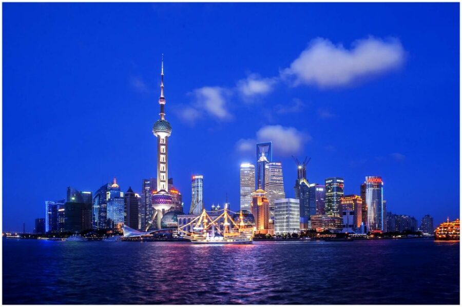 Shanghai: Night River Cruise Tour with Xinjiang Style Dining - Pickup and private transport: skipping the metro grind