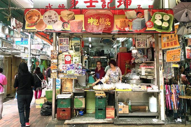 Small Group Kowloon Michelin Rated Street Food and Culture Tour - Sham Shui Po street food: cheong fun, wife cake, pork, and tong shui