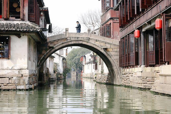 Suzhou and Zhouzhuang Water Village Day Trip from Shanghai - Hotel pickup and the air-conditioned van: comfortable, but traffic is real